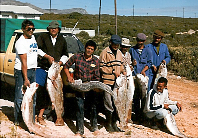 The fishermen: Spencer Bailey, Willem Appel, Brian Damonze, Johny Niewenhuys, Johny Pieters, Elias Booysen, William Gillian & Arthur Gibson in front.